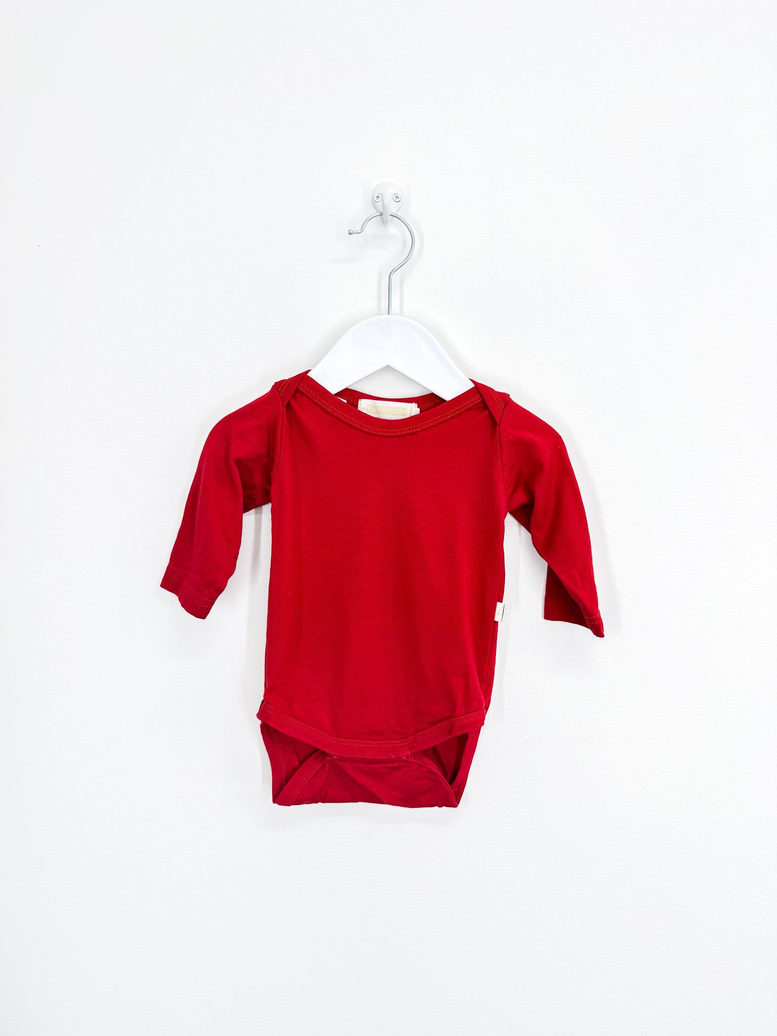 Mokopuna merino bodysuit - red (0-3m)