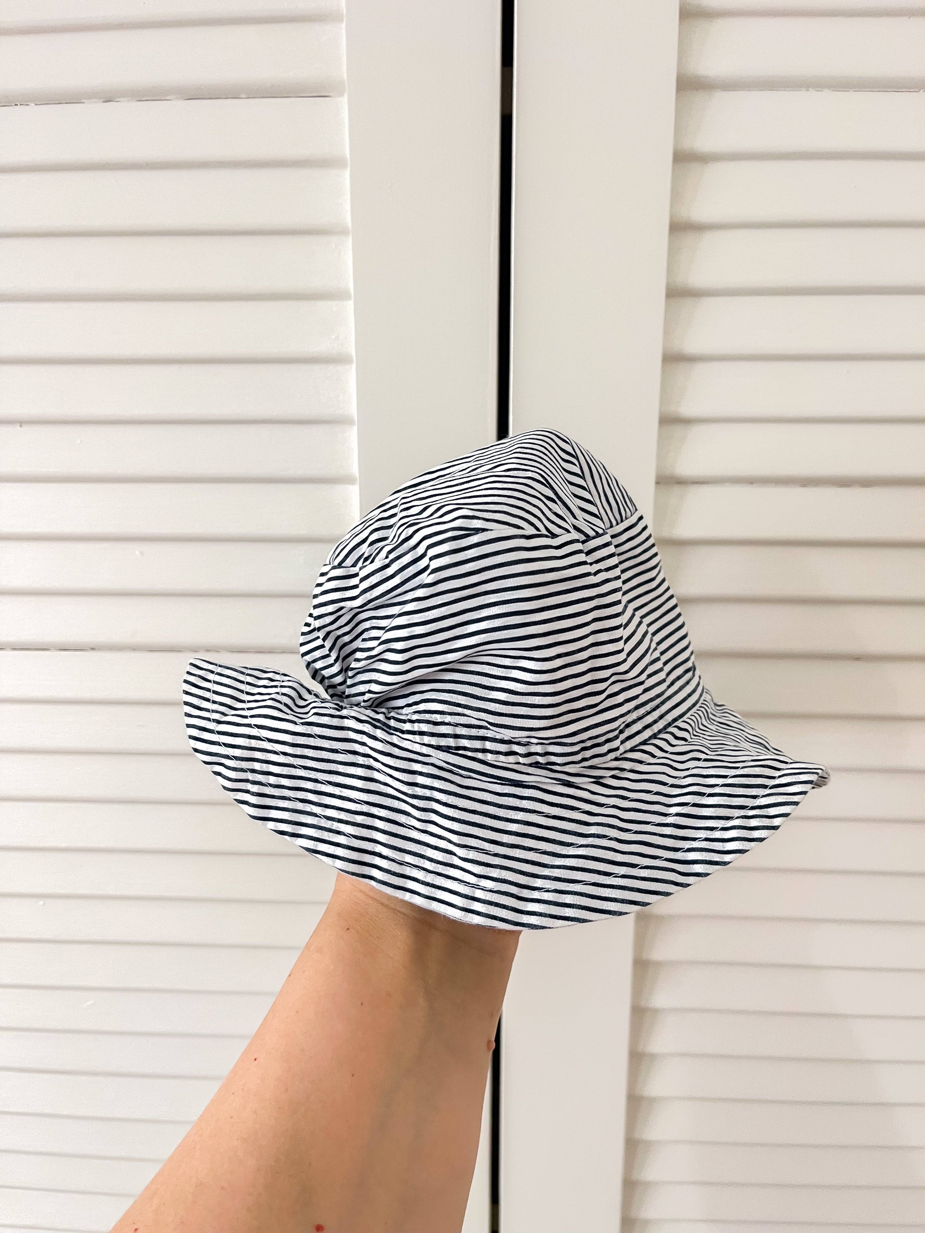 Little Bundle striped bucket hat (newborn)