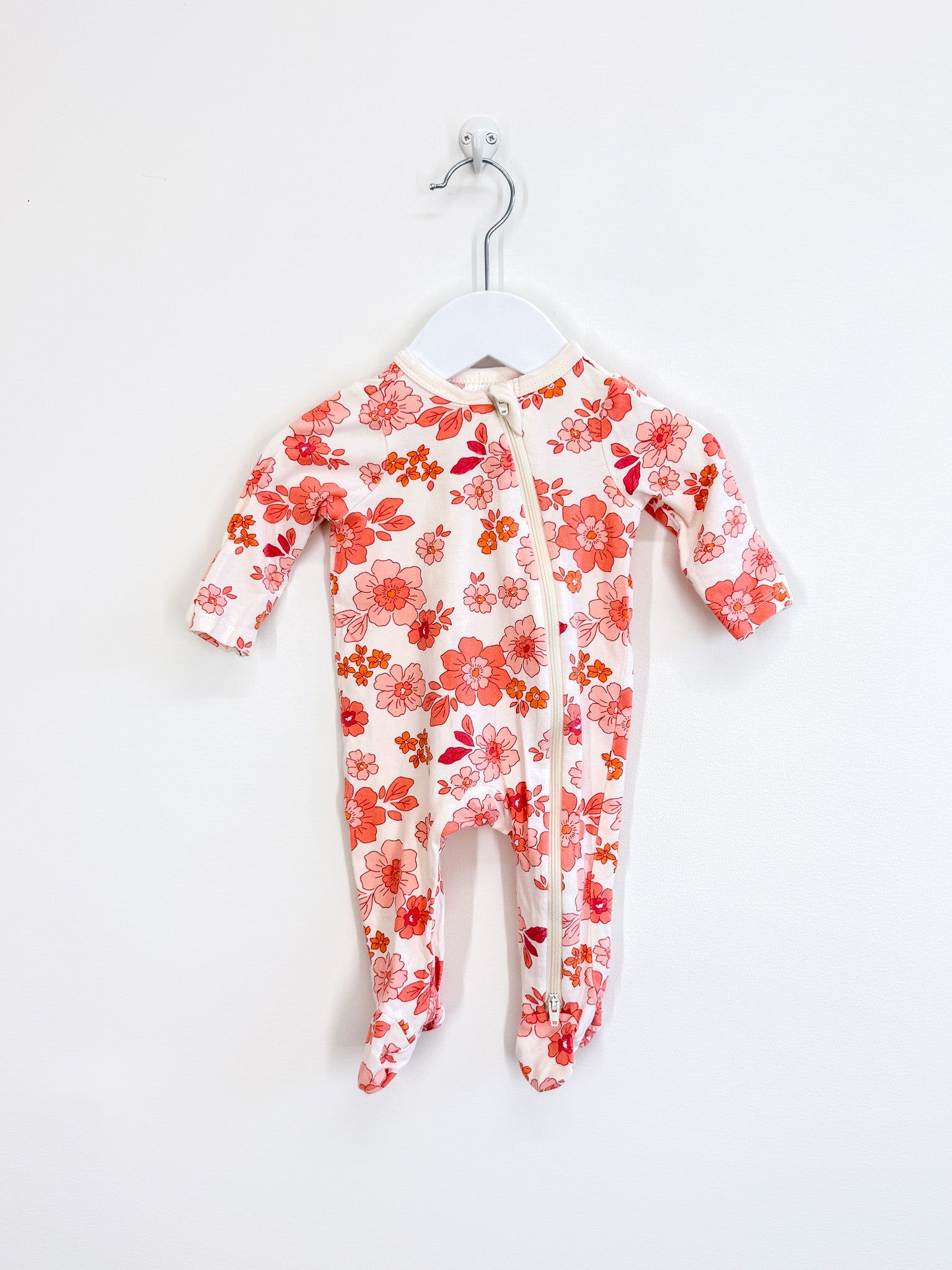 Teeny Weeny peach floral zipsuit (newborn)