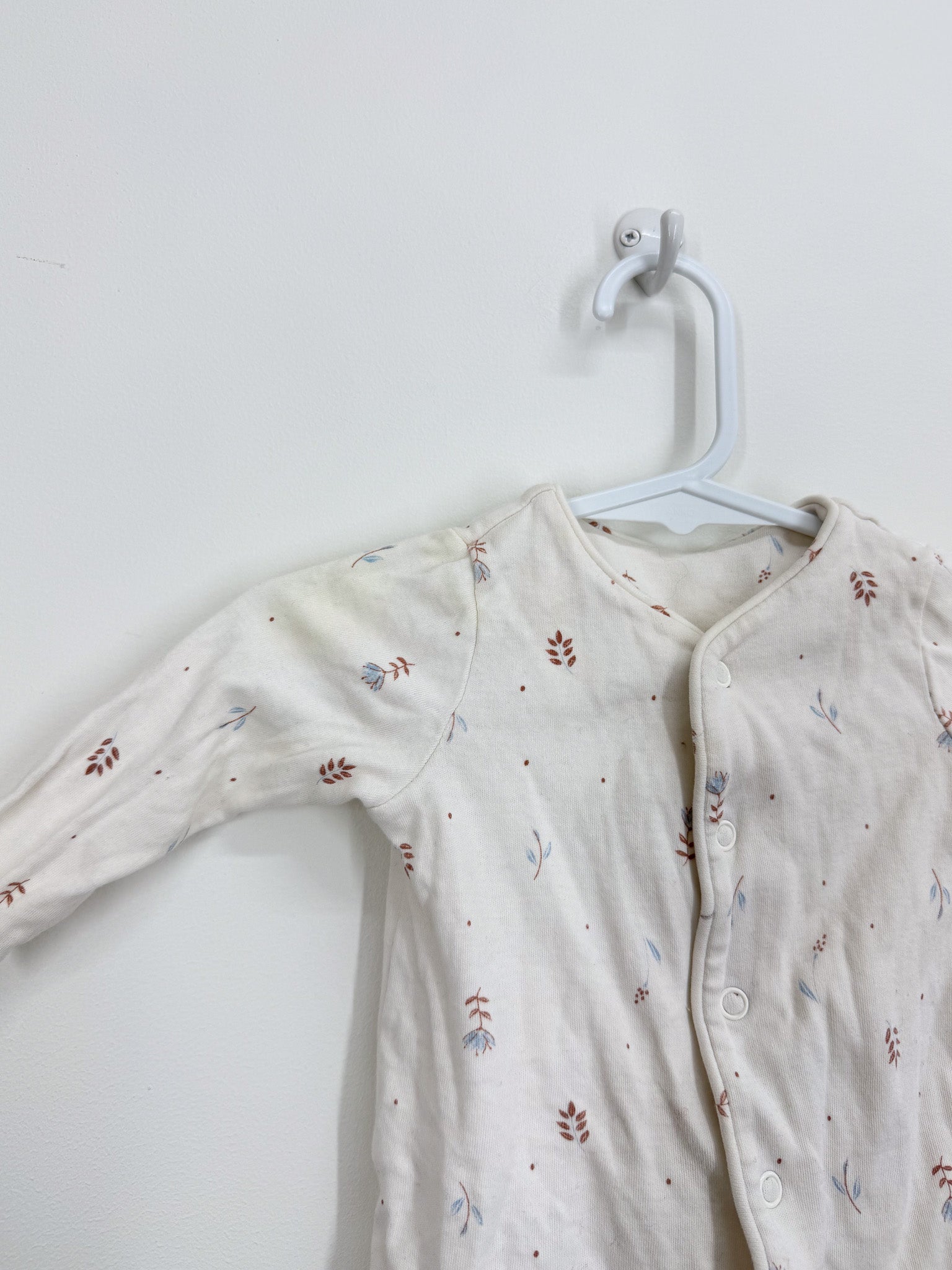 Little Bundle button onesie (newborn) - SECONDS