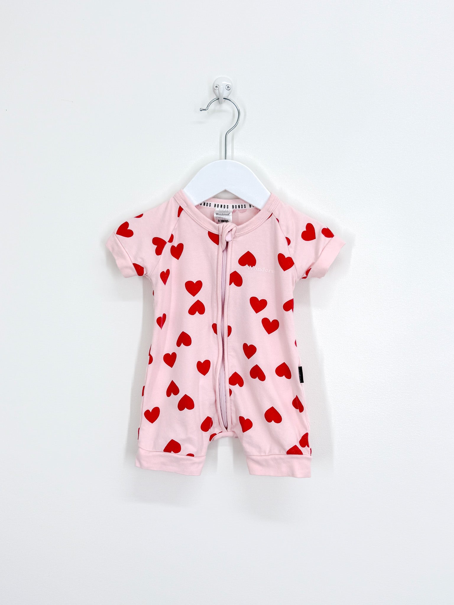 Bonds wondersuit - pink hearts (0-3m)