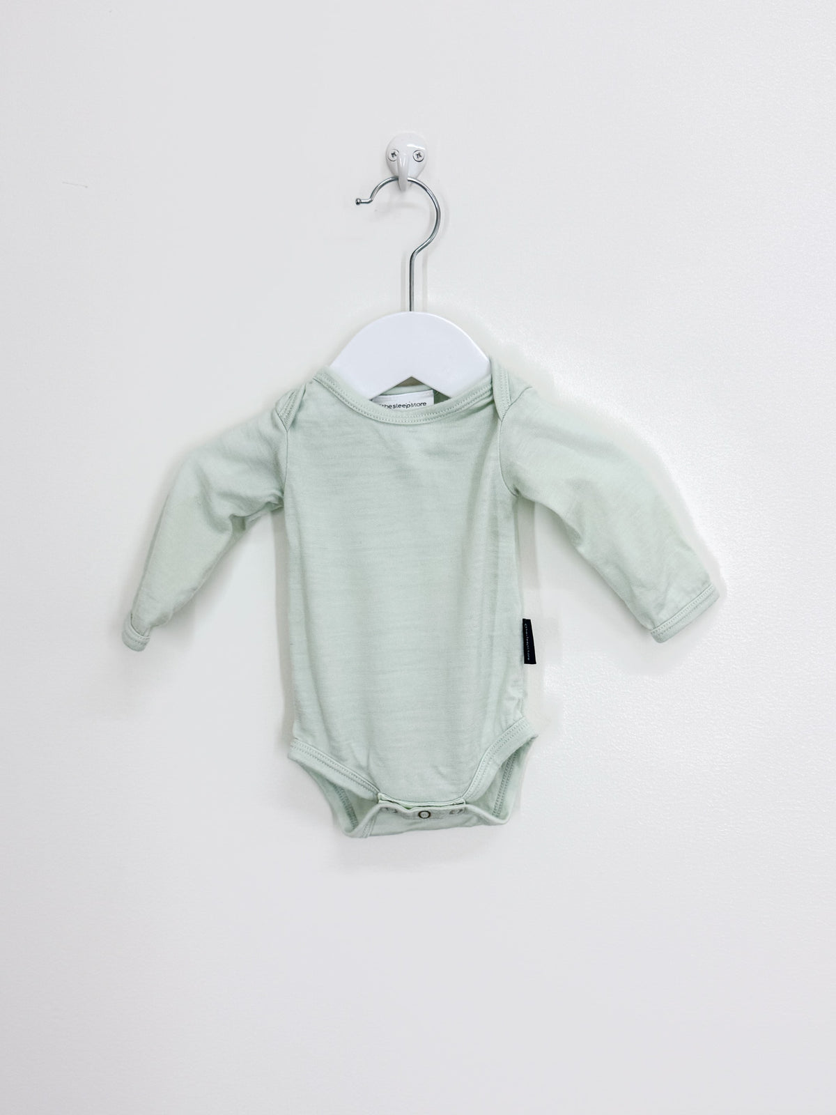 The Sleep Store merino long sleeve bodysuit (newborn)