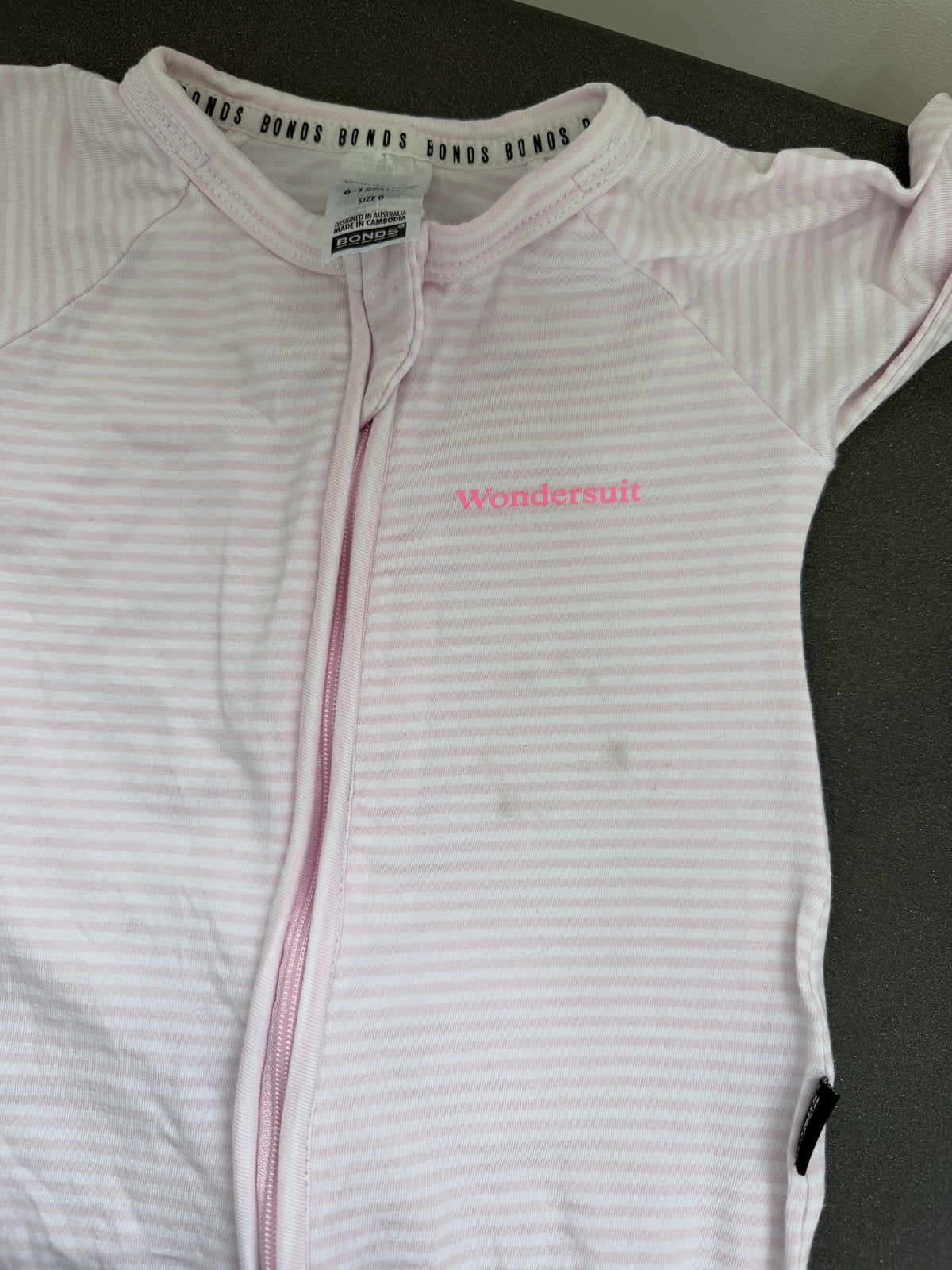 Bonds wondersuit - pink stripe (6-12m)