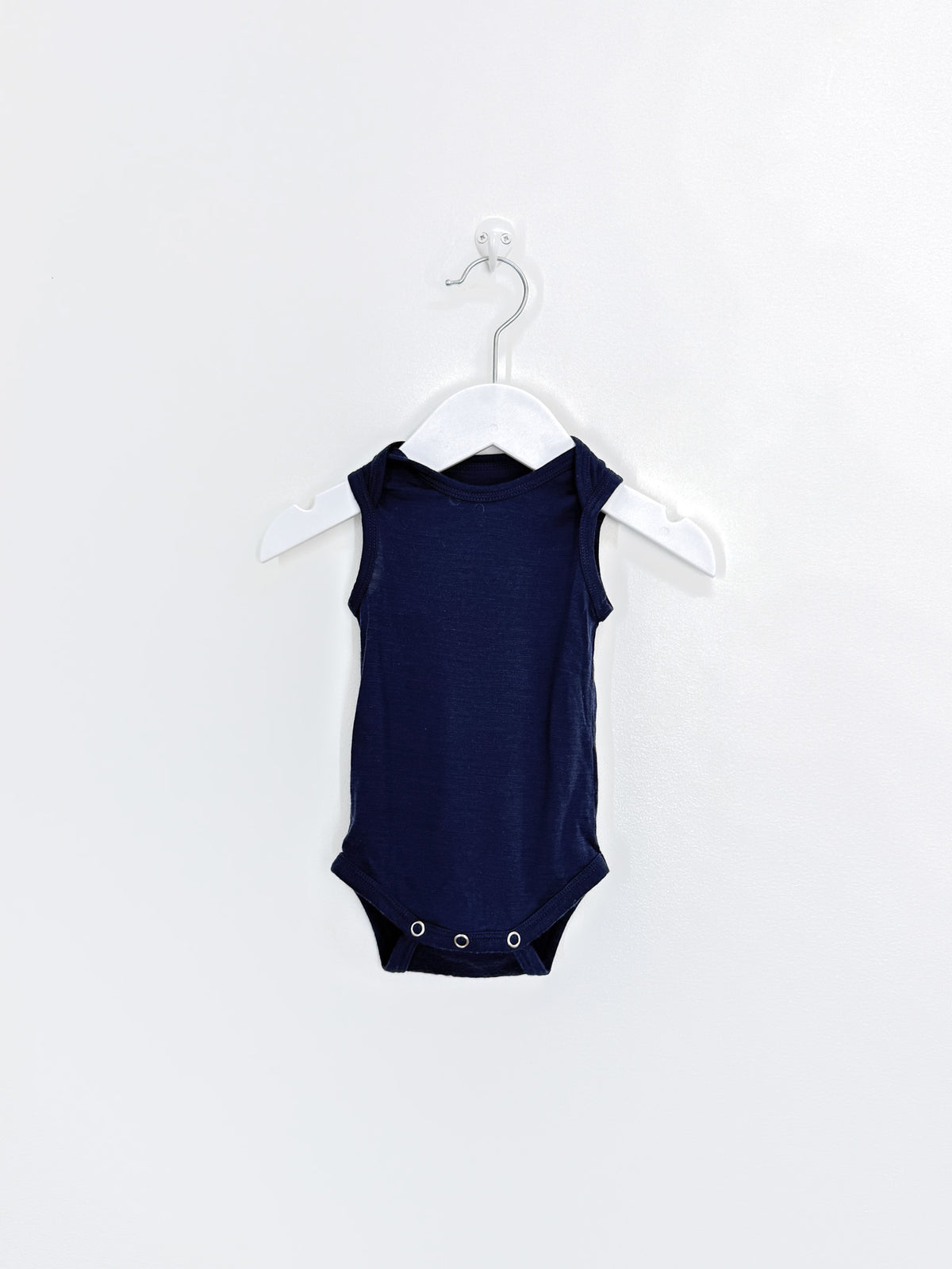 The Sleep Store merino singletsuit - navy (0-3m)