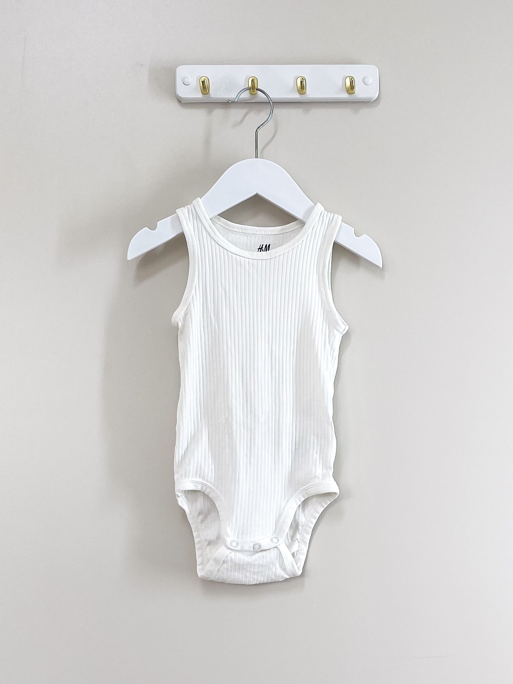 H&M organic ribbed singletsuit (12-18m)