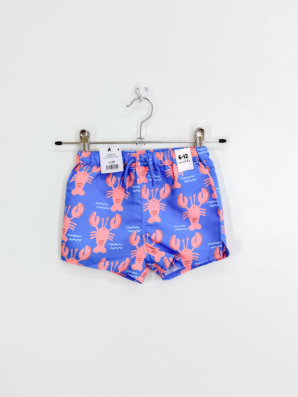 BNWT Cotton On Kids lobster board shorts (6-12m)