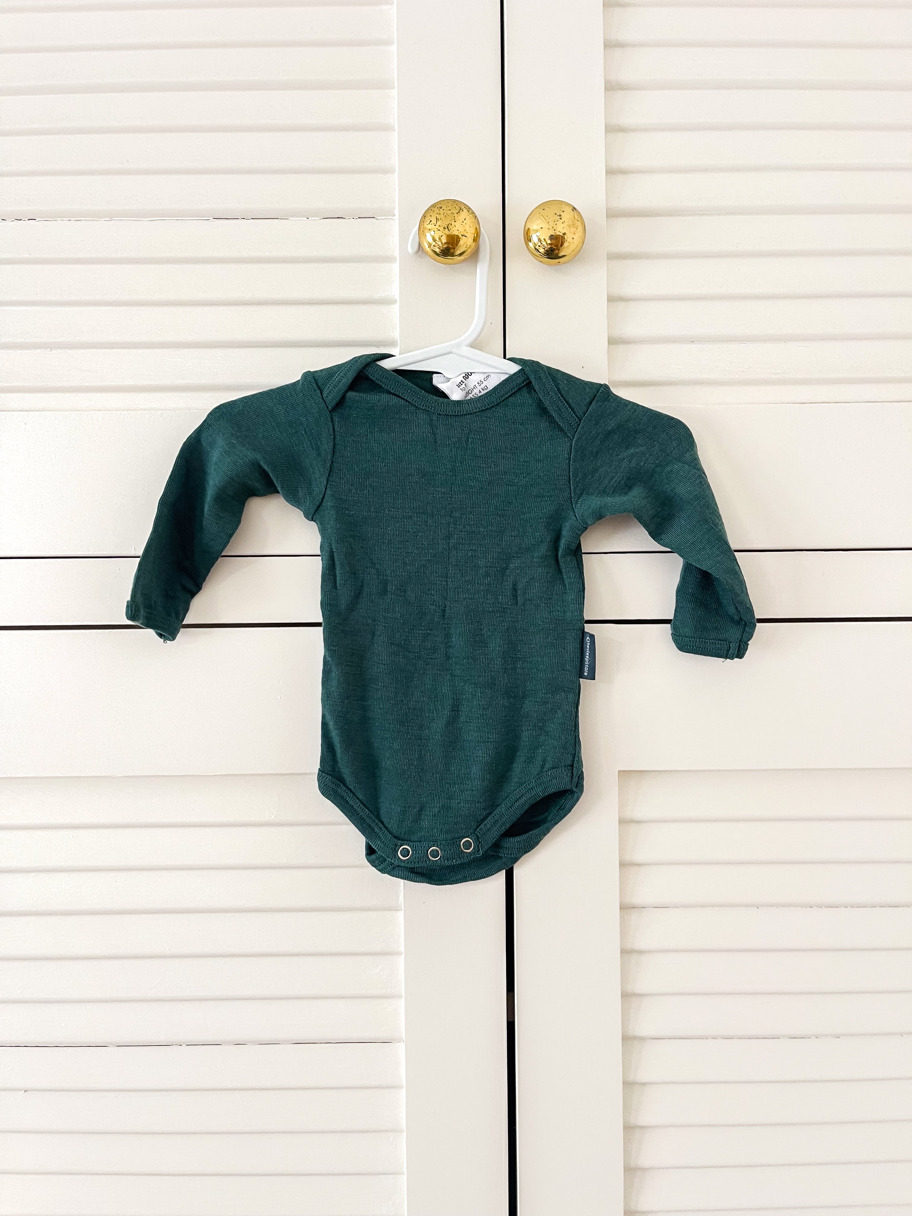 The Sleep Store merino bodysuit - green (newborn)