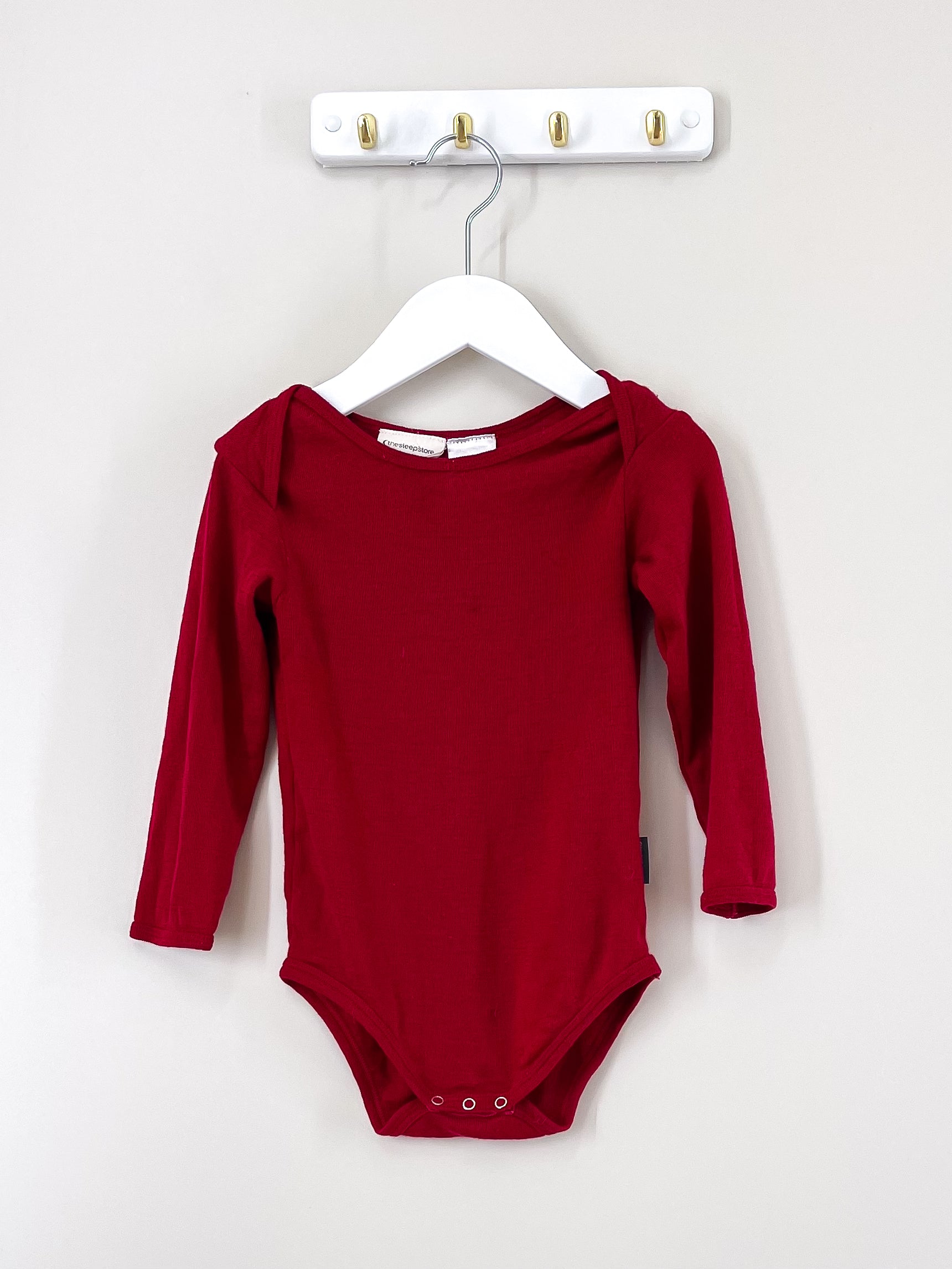 The Sleep Store merino bodysuit (2y)