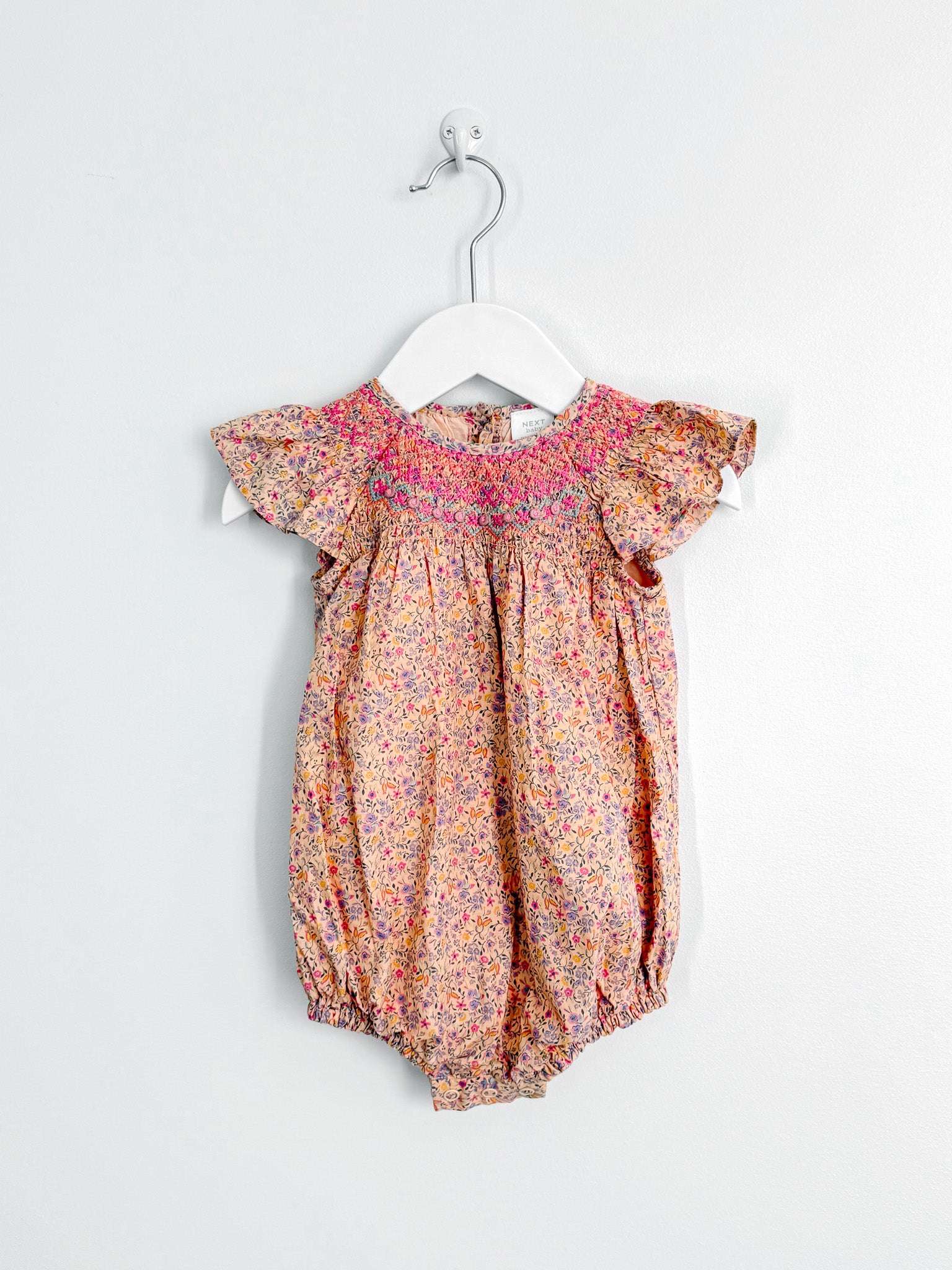 Next smocked floral bodysuit (6-9m)