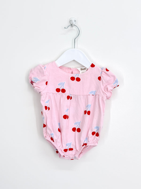 Cotton On Kids cherry romper (0-3m)