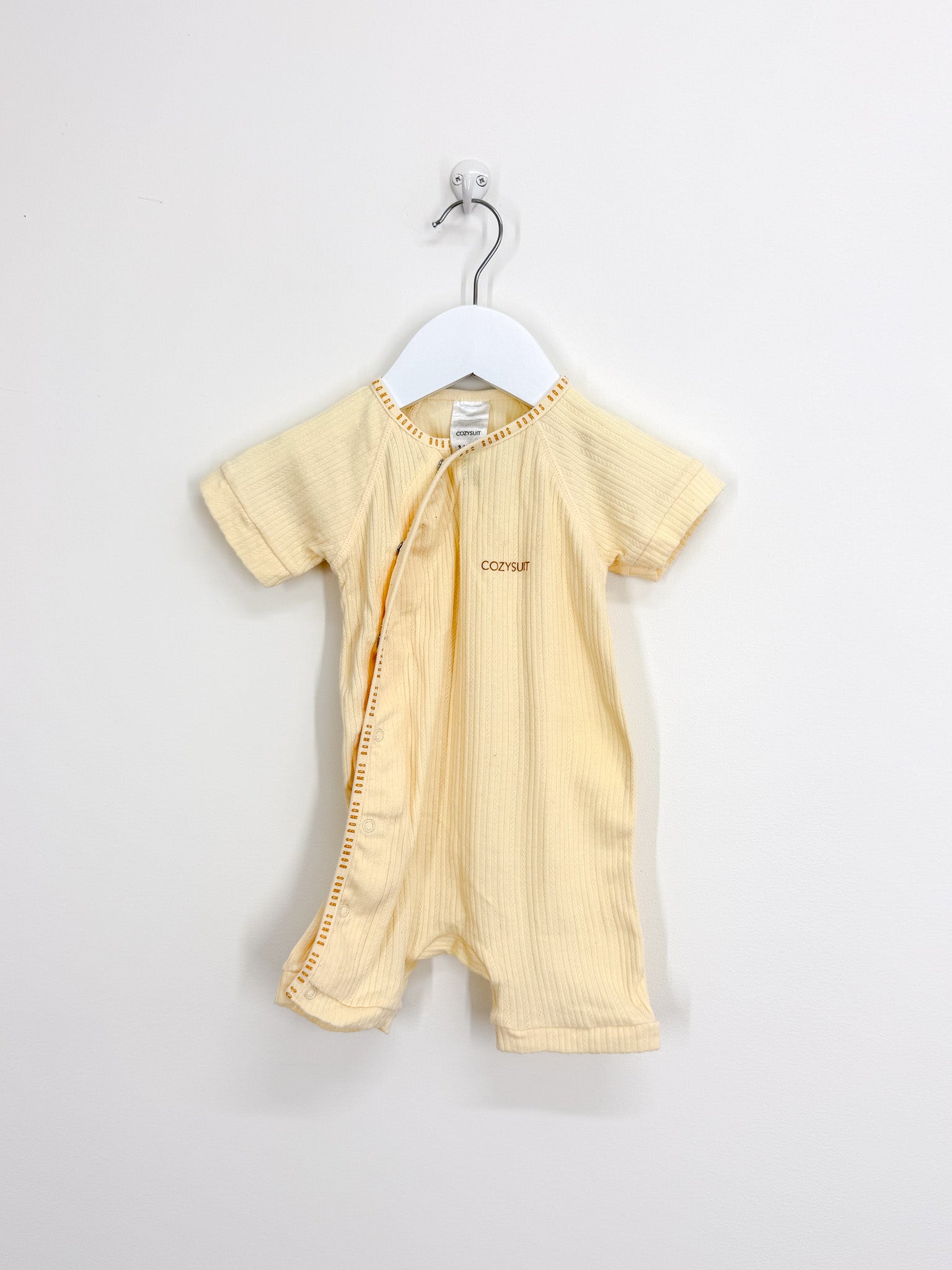 Bonds rib cozysuit - lemon (3-6m)