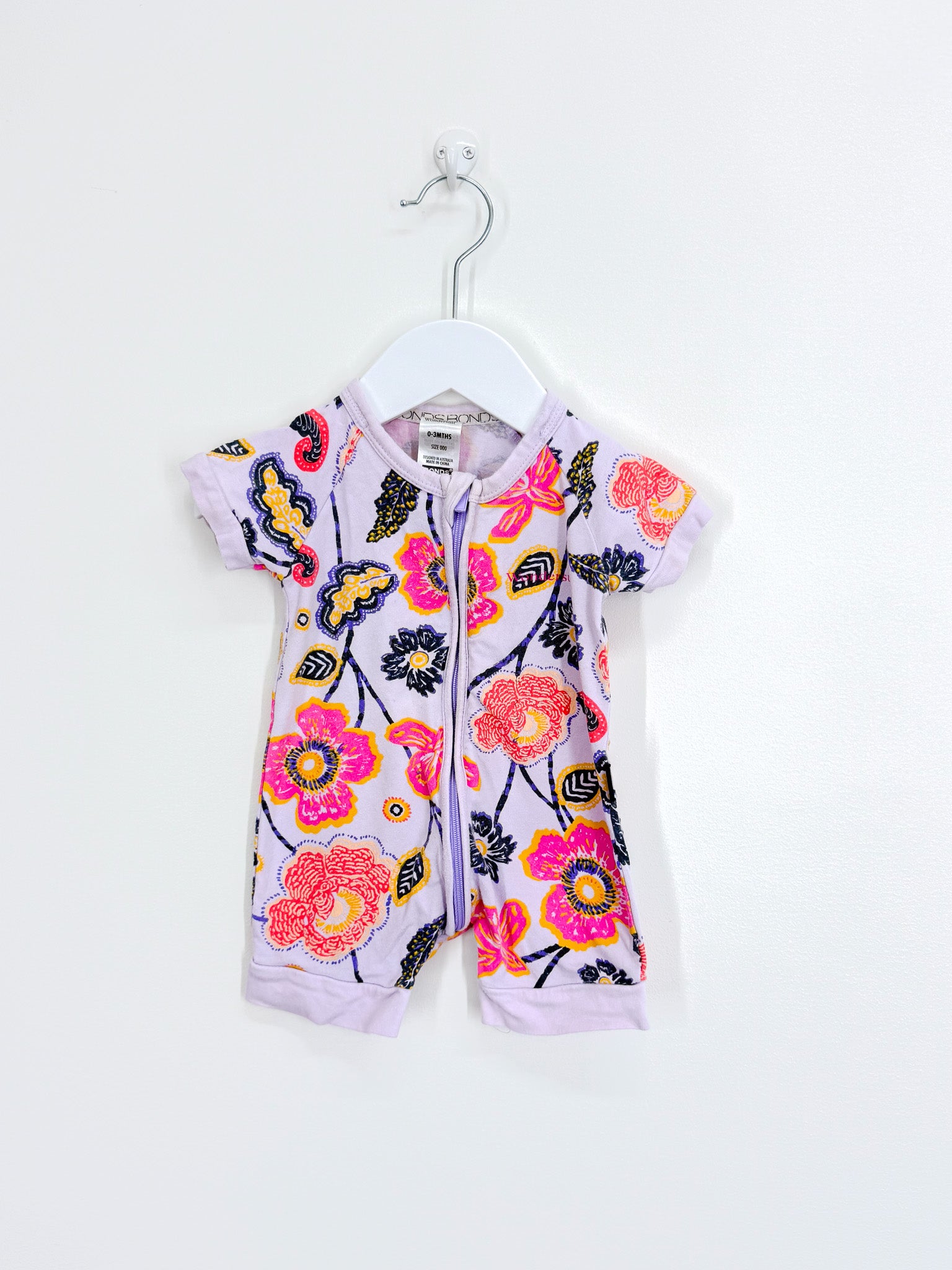 Bonds wondersuit - purple floral (0-3m)