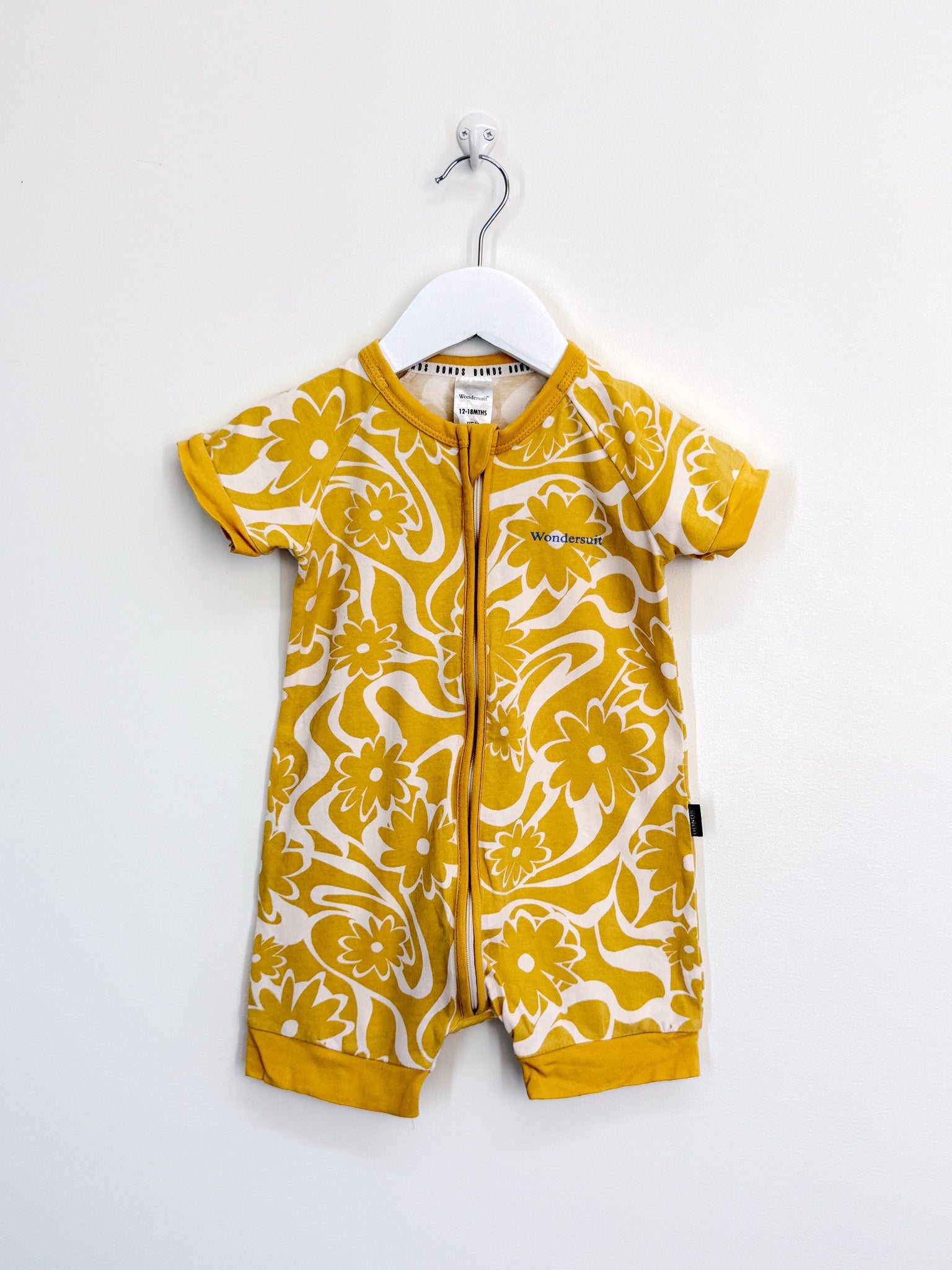 Bonds wondersuit - yellow floral (12-18m)