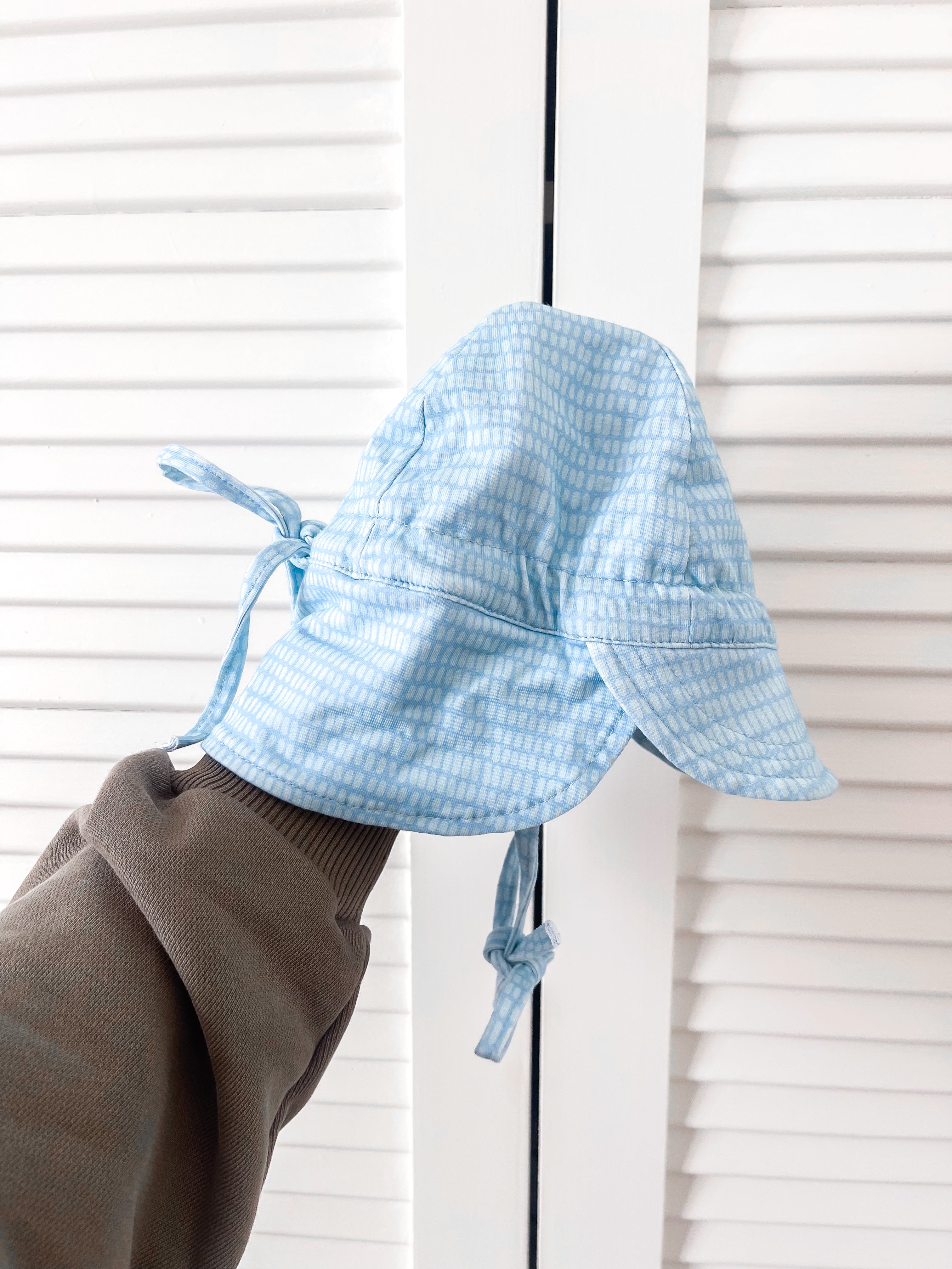 Acorn flap hat - teal dashes (9-18m)