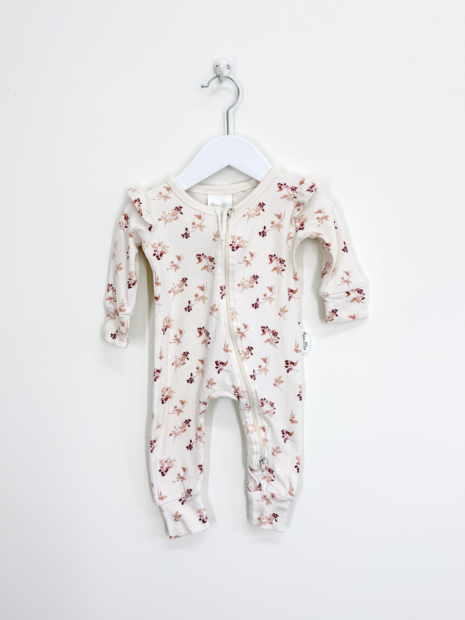 Aster & Oak organic floral frill zipsuit (0-3m)