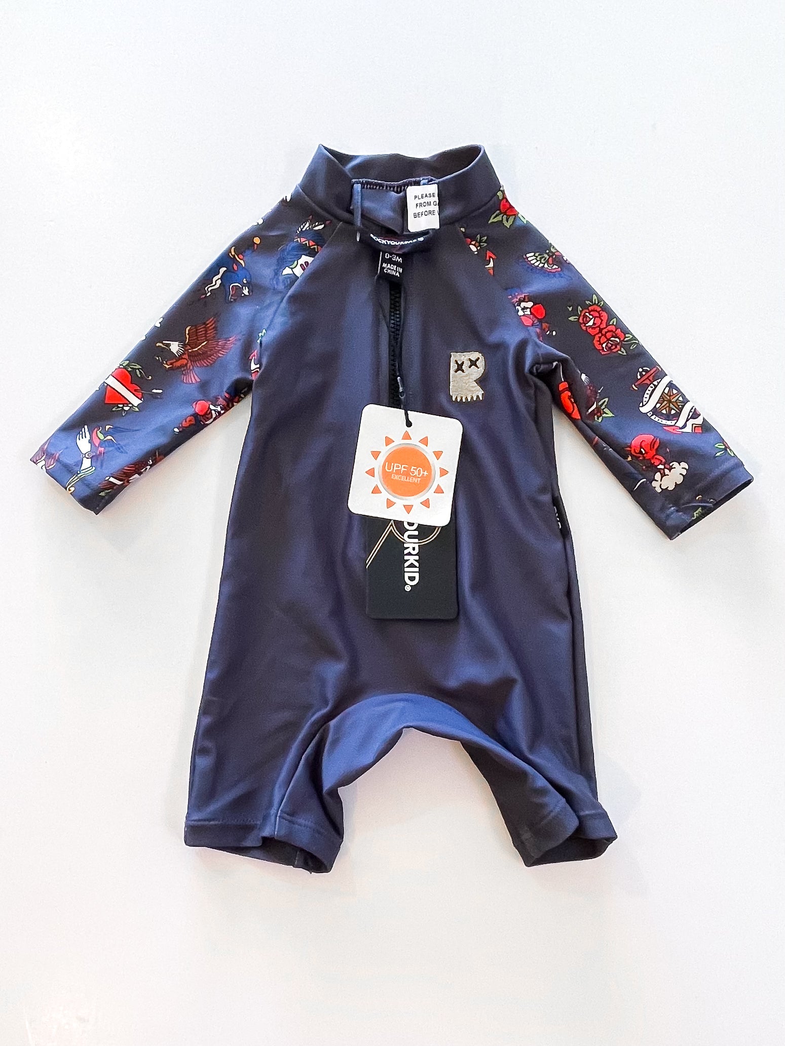 BNWT Rock Your Baby inked swimsuit (0-3m)