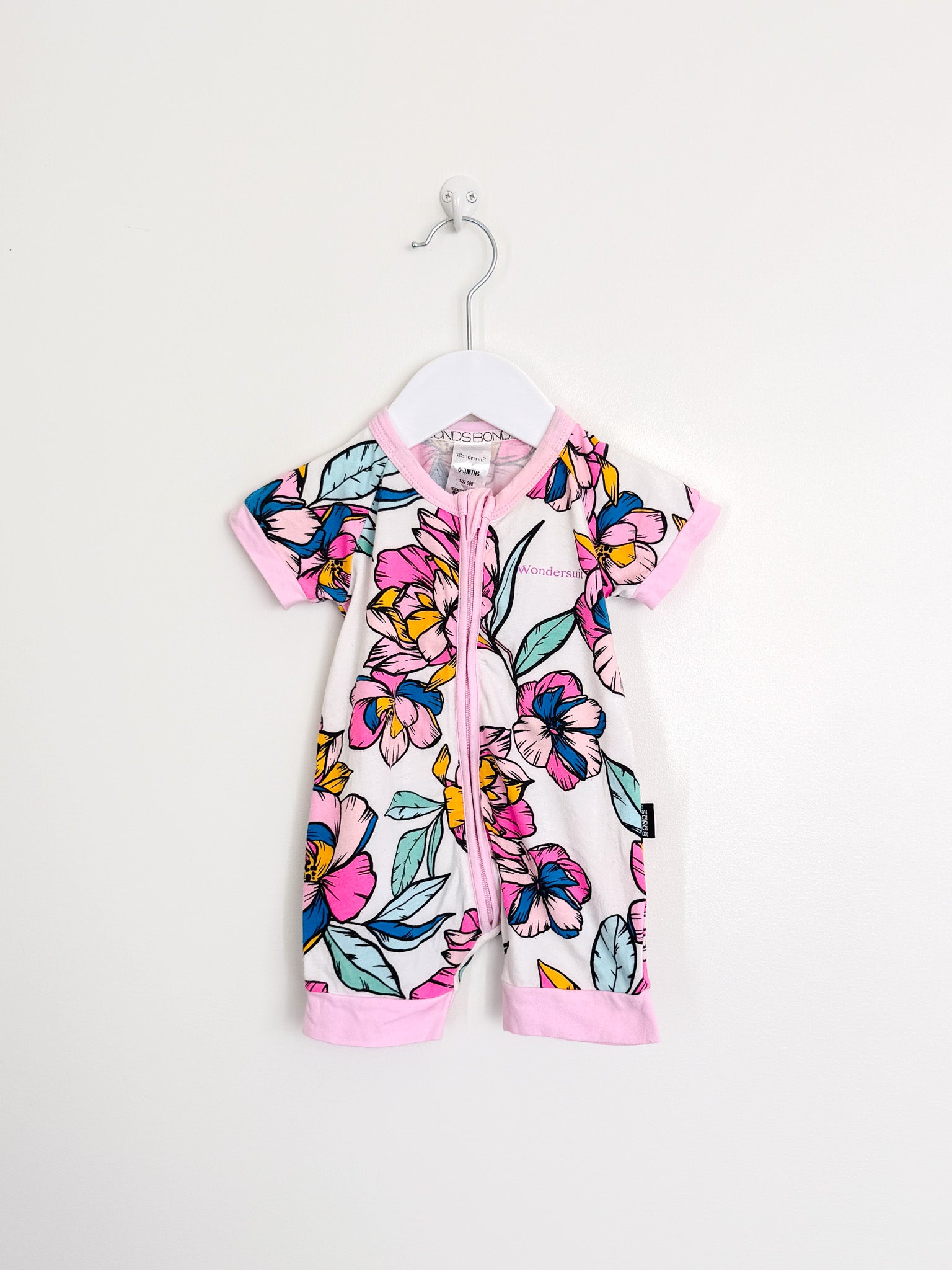 Bonds wondersuit - pink white floral (0-3m)