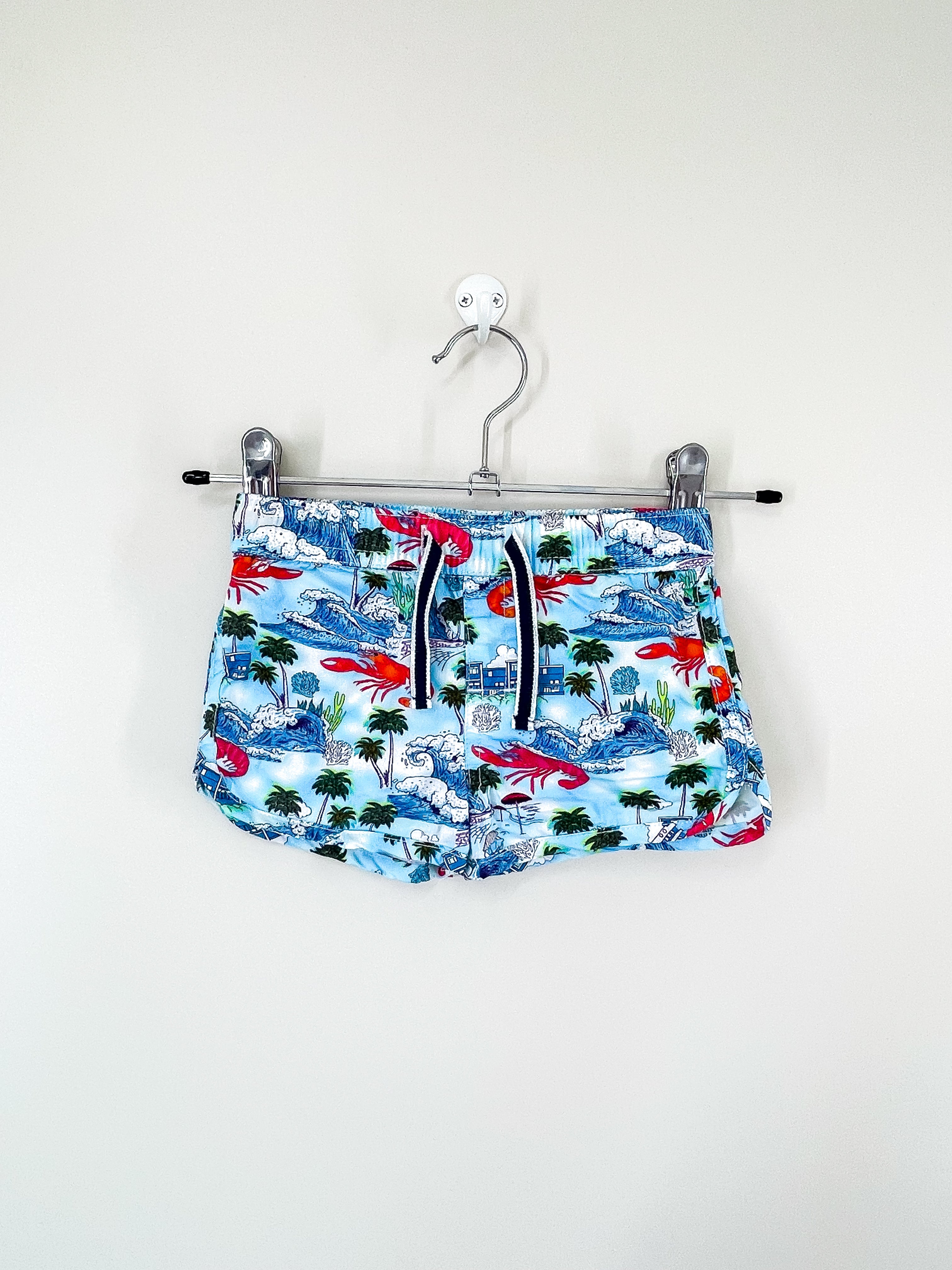 Milky print board shorts (3-6m)
